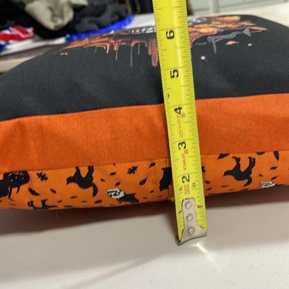 Homemade brand new accent T-shirt pillow. Black and orange autumn skull.